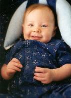 Future paleontologist
Dinos on the outfit).